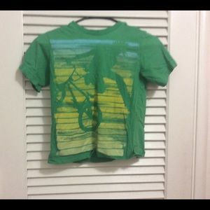 Green graphic Tee Shirt.